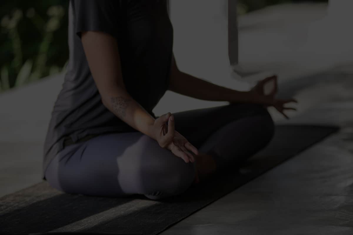 Seated meditation in the quiet of the shala