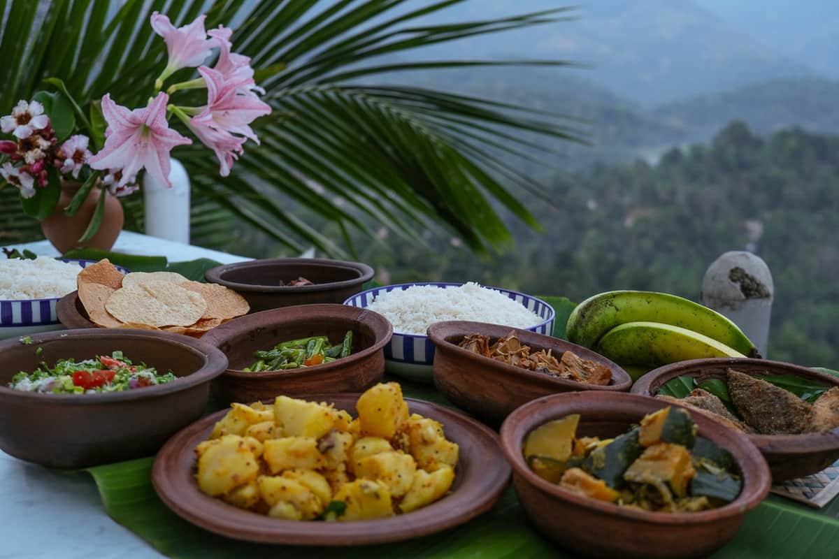 A Sri Lankan lunch on the terrace: rice, curries, poppadoms and bananas grown on the estate