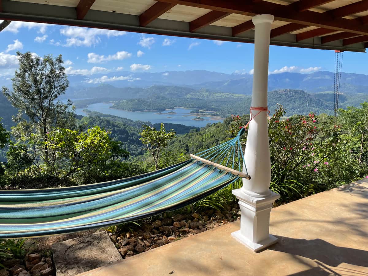 A hammock on the veranda, looking down to Victoria Lake