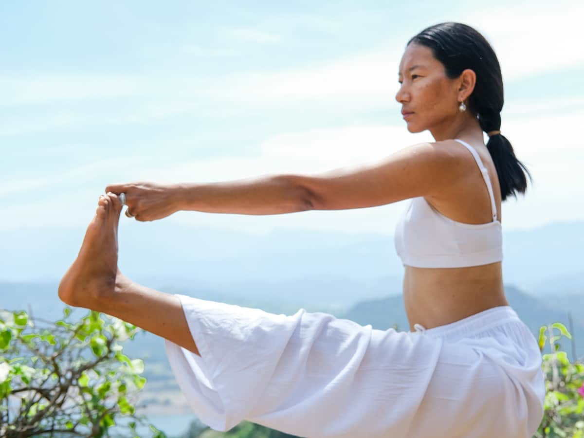 A guest stretching during the morning class