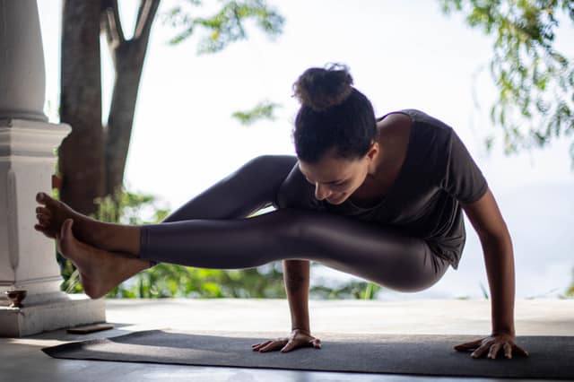 An arm balance during the morning practice