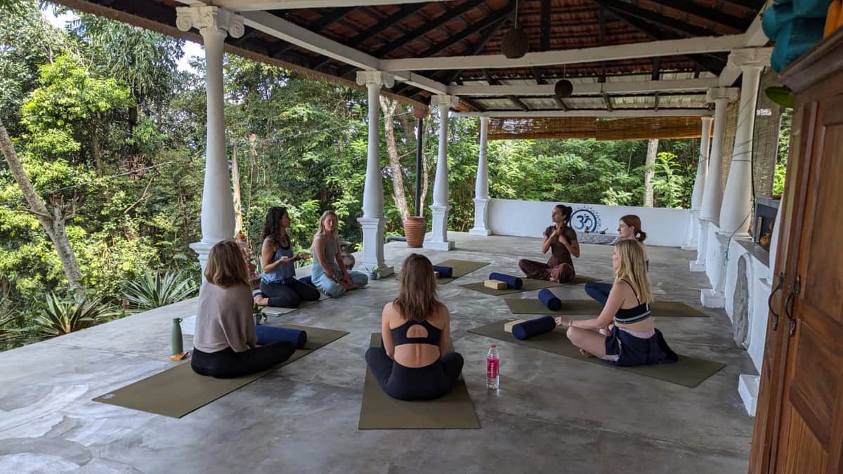 A morning class in the Yin Shala, under its tiled roof