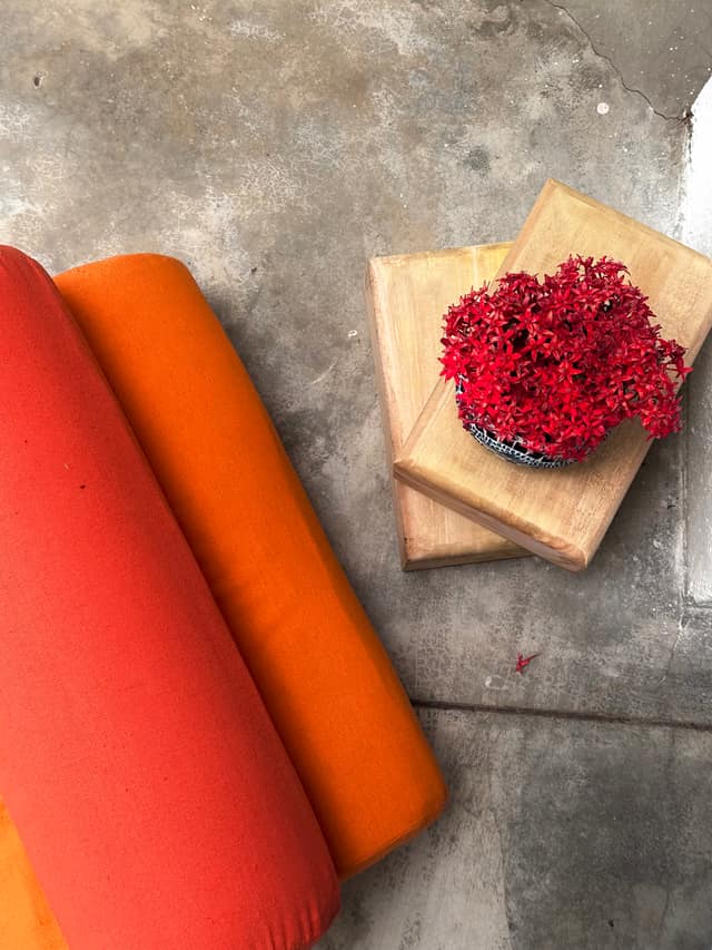 Bolsters and blocks made on the estate, laid out before a class
